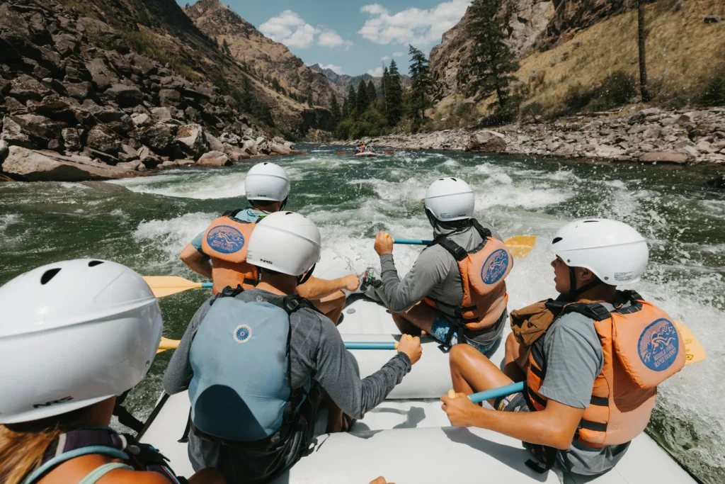 Paddle crew running whitewater rapids on the Middle Fork of the Salmon River